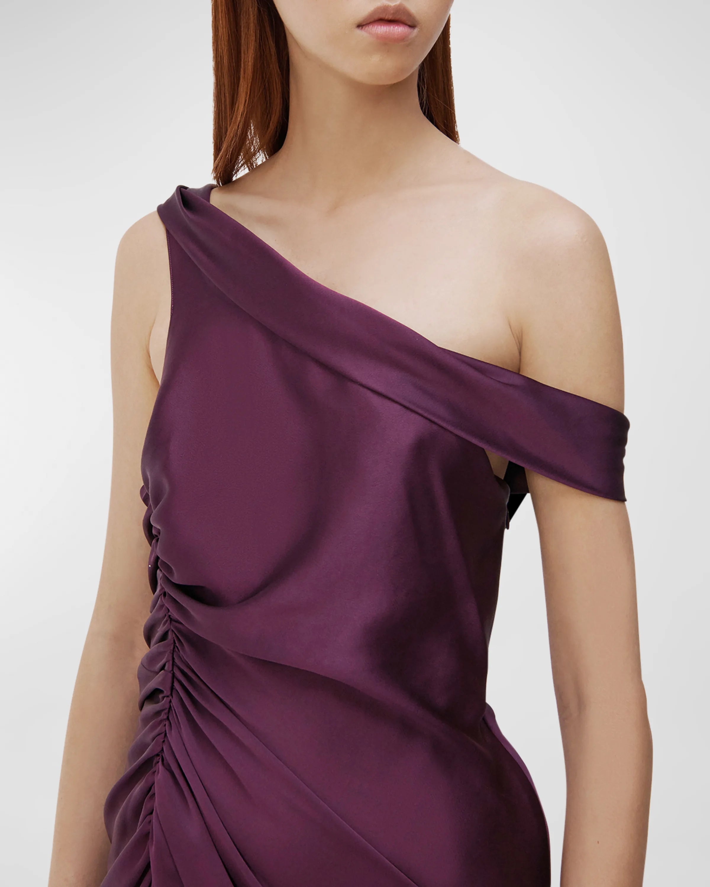 A noble one shoulder sleeveless off the shoulder and floor length prom dress