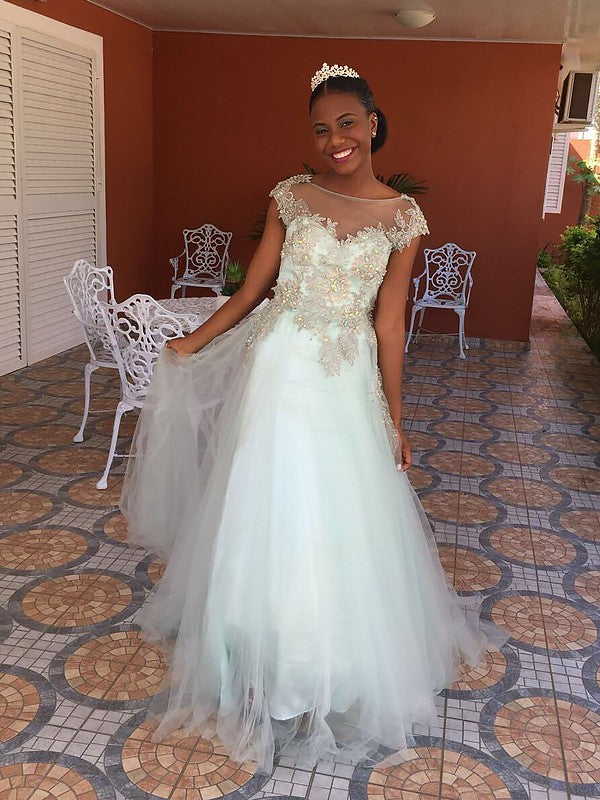 Abiti in tulle con applicazioni a trapezio/principessa, senza maniche e lunghezza al pavimento