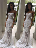 Vestidos de novia de encaje sin mangas con apliques y cola de corte corazón y corte trompeta/sirena