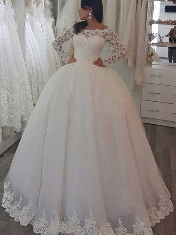 Vestidos de novia de encaje con apliques y cola larga, hombros descubiertos y corte de baile