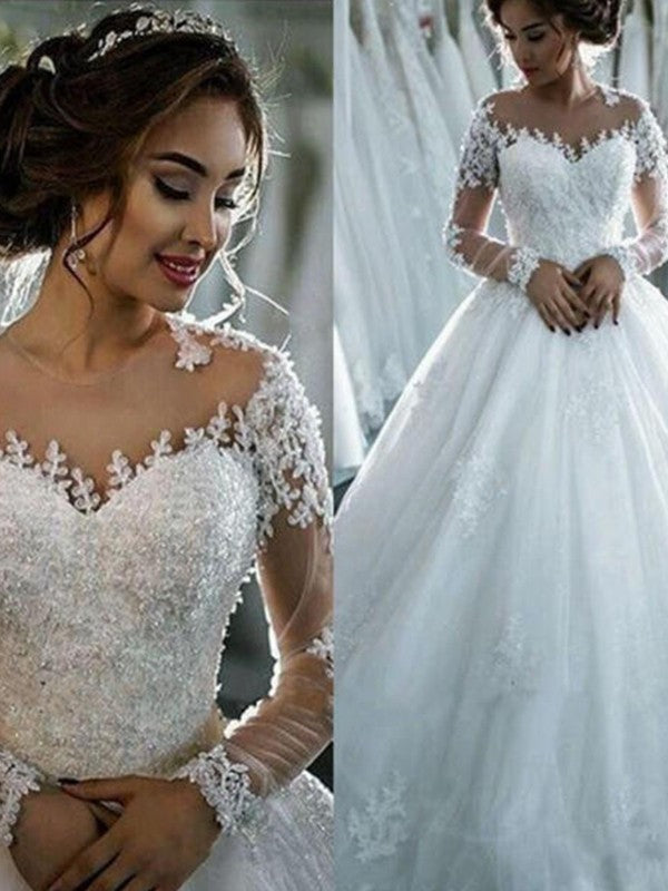 Vestido de novia con apliques de tul, escote redondo, mangas largas y cola de corte