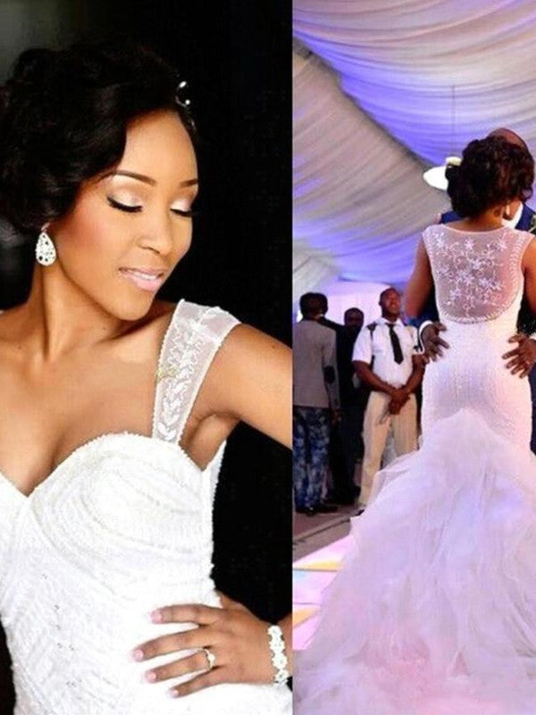 Vestidos de novia de corte trompeta/sirena con escote corazón, cuentas, organza, sin mangas y cola de corte