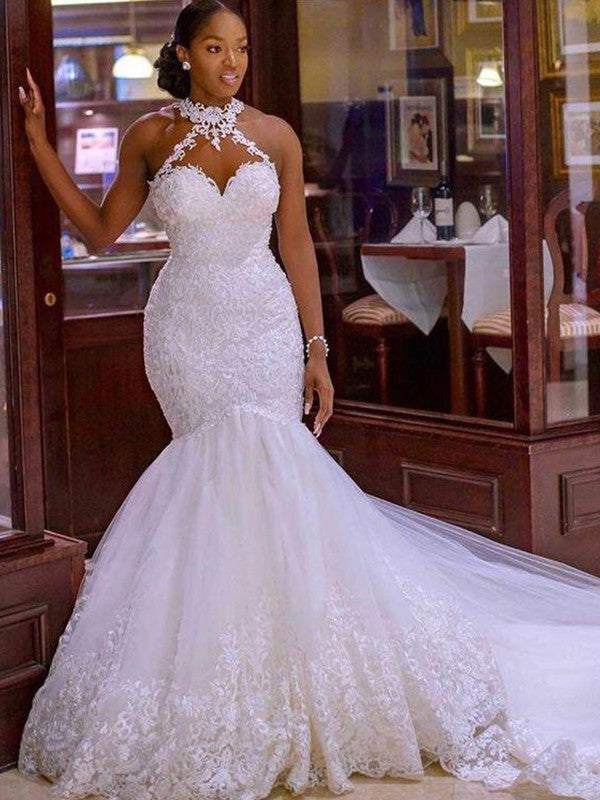 Vestidos de novia de corte trompeta/sirena, de tul, con encaje, halter, sin mangas y cola larga