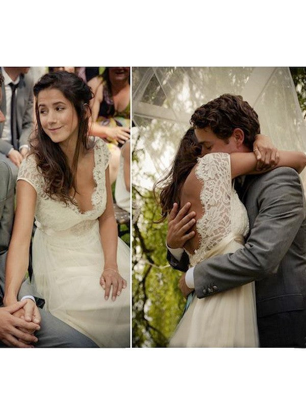 Vestidos de novia de tul con pedrería, corte princesa, escote en V, cola larga y sin mangas