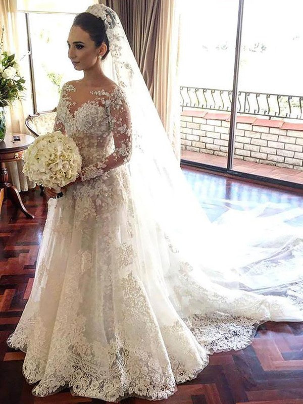 Vestidos de novia de tul con corte princesa, corte barco, mangas largas, encaje y cola capilla
