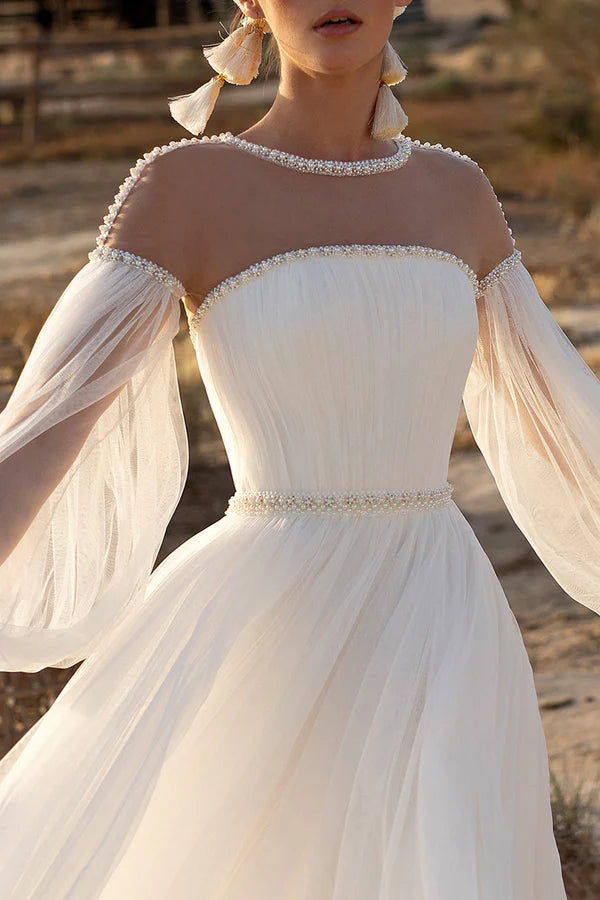 Abito da sposa bohémien a trapezio con scollatura a V e maniche lunghe in perle