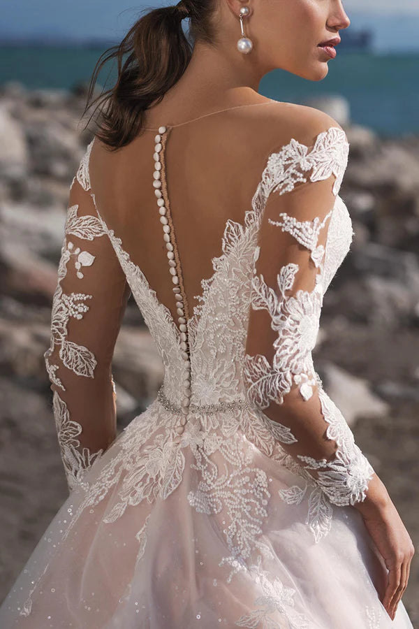 Abito da sposa a trapezio con maniche lunghe e colletto illusione in pizzo