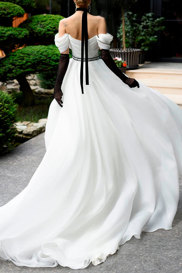 A Line strapless organza ivory rustic wedding dress paired with court train