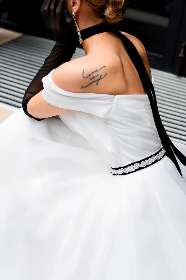 A Line strapless organza ivory rustic wedding dress paired with court train