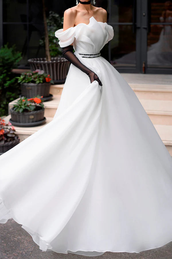 A Line strapless organza ivory rustic wedding dress paired with court train