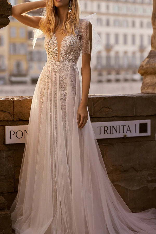 Vestido de novia bohemio brillante con apliques de encaje y escote en V profundo en forma de A