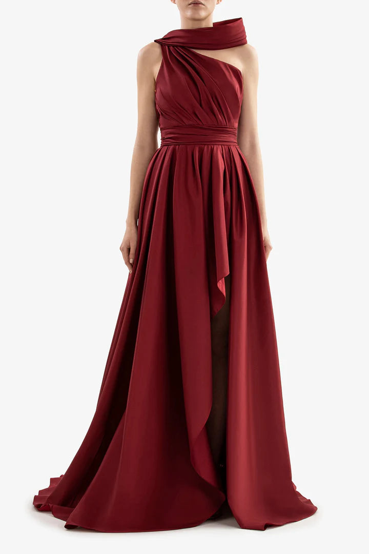 One shoulder pleated garment with evening gown