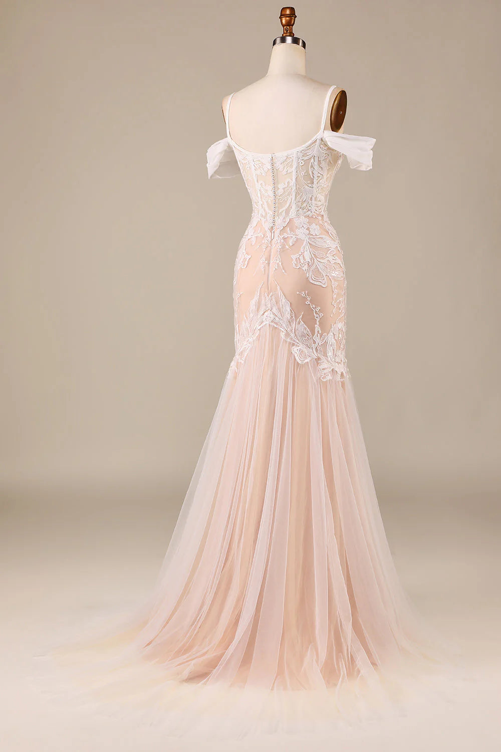 Champagne colored slim shoulder lace fishtail and floor length wedding dress